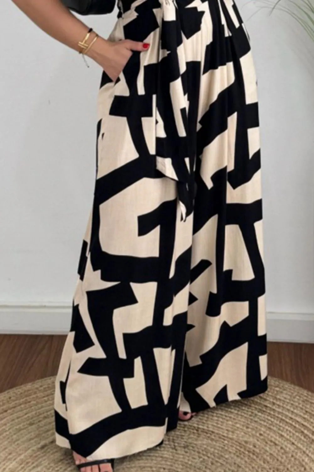 Hazel Blues® |  Printed Surplice Sleeveless Tie Waist Jumpsuit