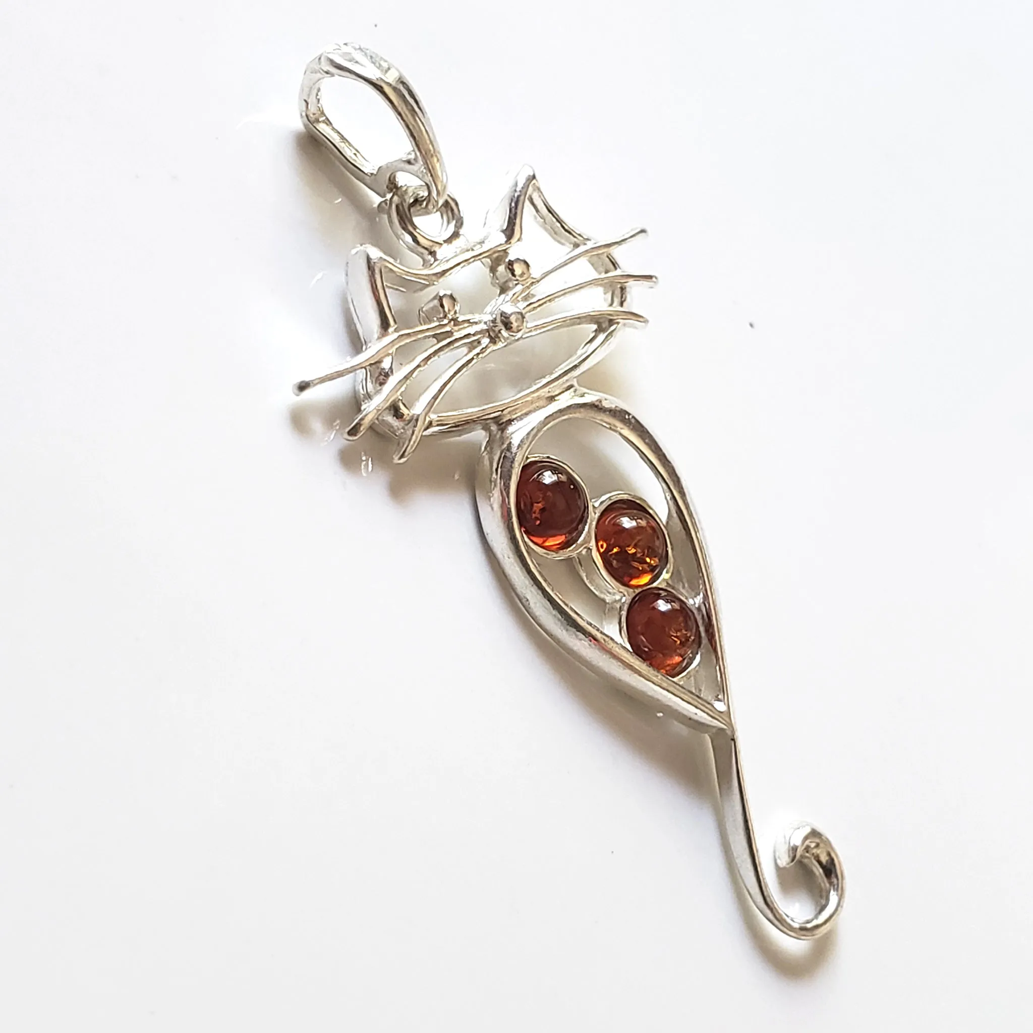 Long Tail Cat Silver Pendant with Natural Amber
