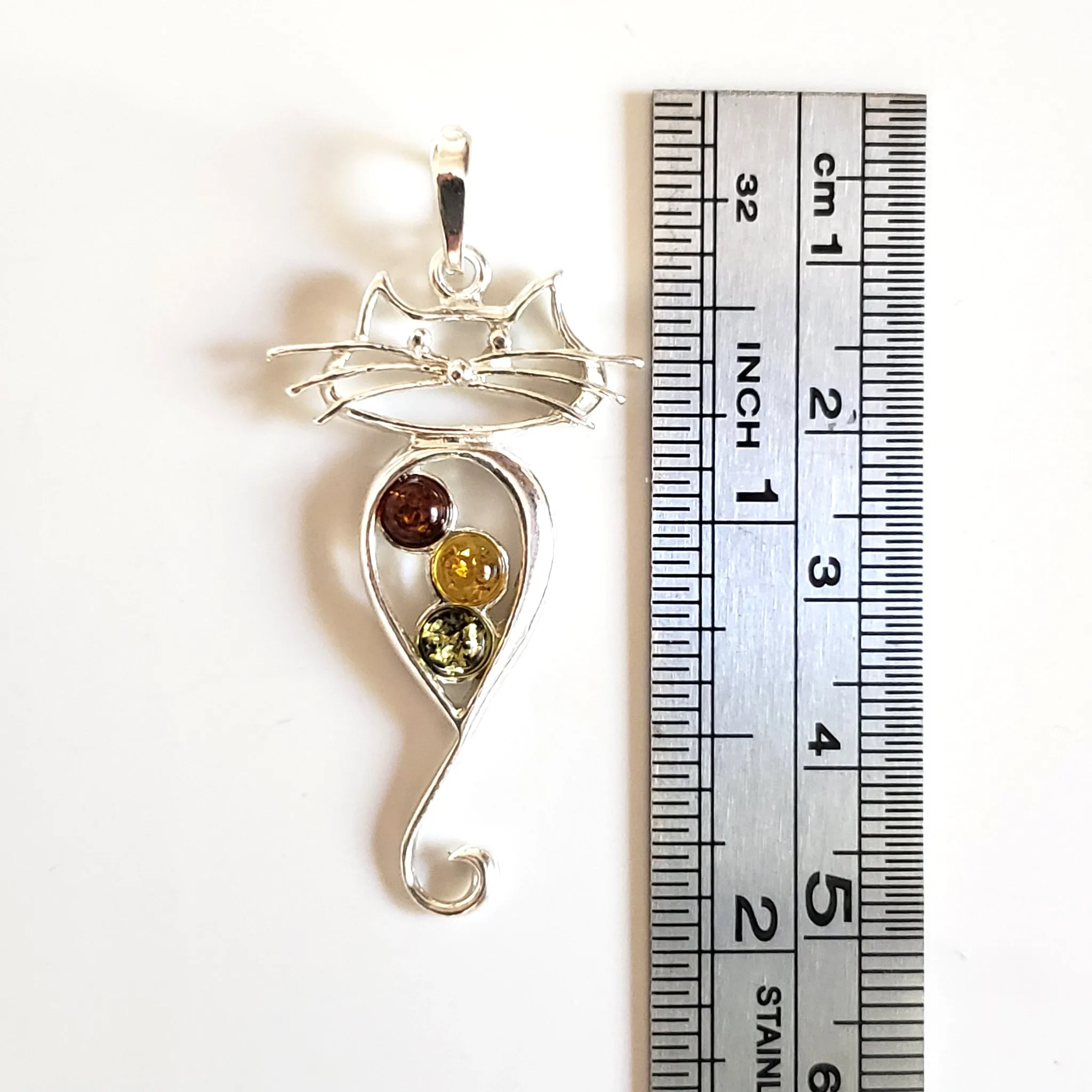 Long Tail Cat Silver Pendant with Natural Amber