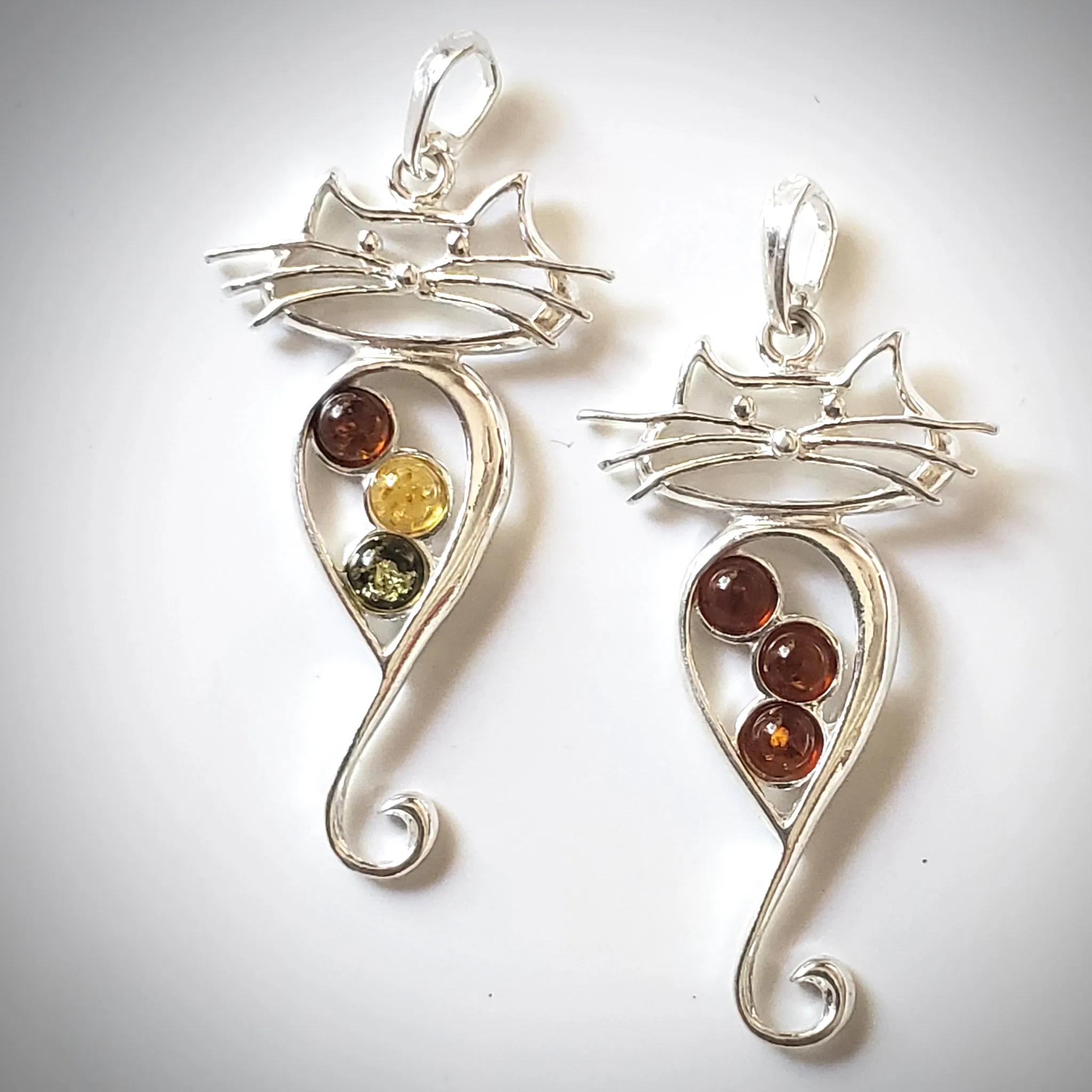 Long Tail Cat Silver Pendant with Natural Amber